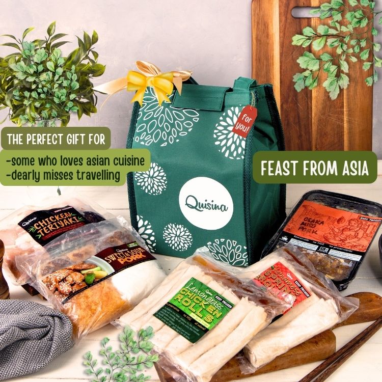 A green thermal gift bag branded 'Quisina' with 'Feast From Asia' text, containing various Asian cuisine food items such as Thai Teriyaki, Vietnamese Spring Rolls, Lemongrass Chicken Rolls, Sweet & Sour Pork, and Osaka style pork stew, presented as a perfect gift for someone who loves Asian cuisine.